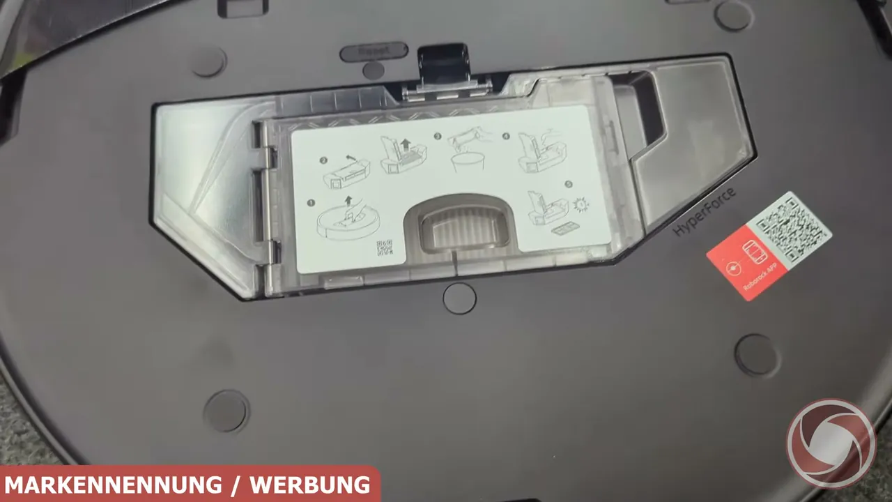 Unter der oberen Abdeckung des Gehäuses befindet sich der Staubbehälter des Roboters.
